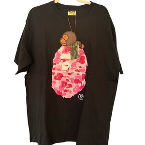 A Bathing Ape: Pink and Black Short Sleeve Tee with Vibrant Organic Design